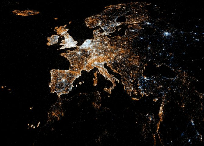 europe from space at night with bright lights